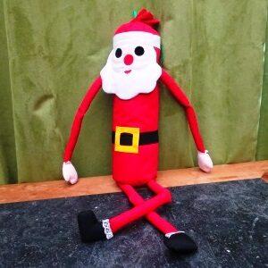 Kerstmanpop met lange benen