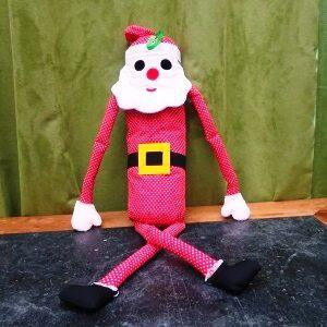 Kerstmanpop met lange benen