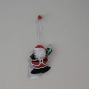 Kleine kerstman met pakje